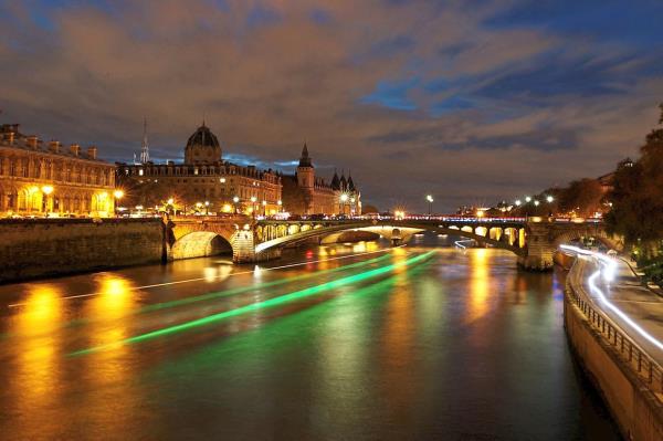 The river Seine at night in Paris. Some of the swimming events in next year’s Olympics will be held at the river. 