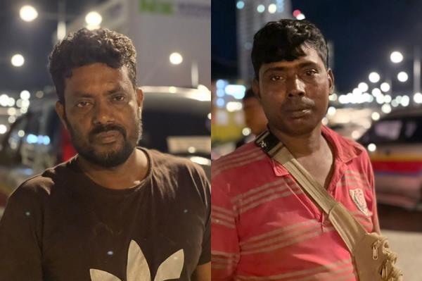 Workers Mohidul Islam (left) and Md Ikhtiar managed to escape the building before the collapse. - Photo: Bernama