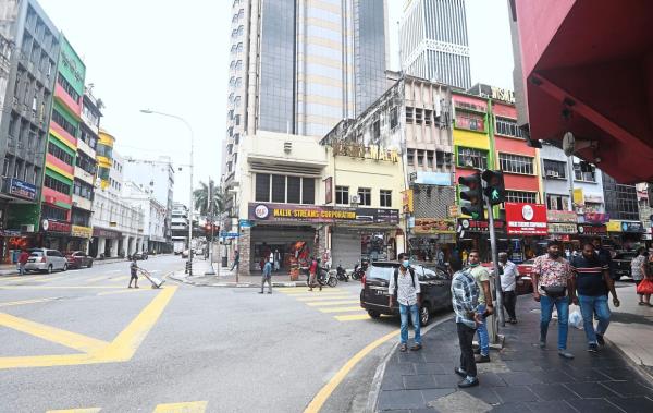 Back to normal: People walking around Jalan Silang yesterday. — AZHAR MAHFOF/The Star