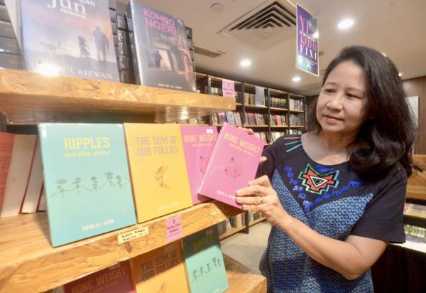Kow's books - including the new 'Bone Weight' - have been released and reissued by local publisher Fixi. Photo: The Star/Raja Faisal Hishan 