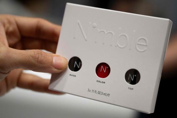 Nail polish used in Nimble Beauty’s Nimble Device is seen during Pepcom's Digital Experience at the The Mirage resort during the Co<em></em>nsumer Electro<em></em>nics Show (CES) in Las Vegas, Nevada. — AFP