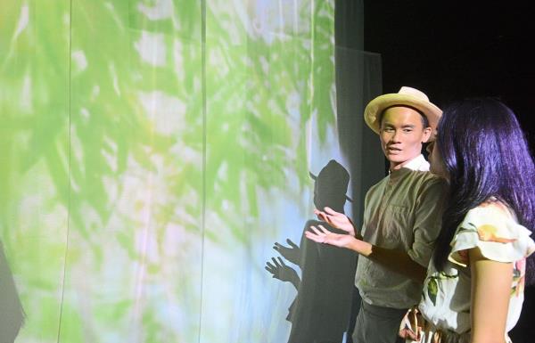 Visitors getting a closer look at the plant motifs that play out across the fabric screens. Photo: The Star/Jeremy Tan