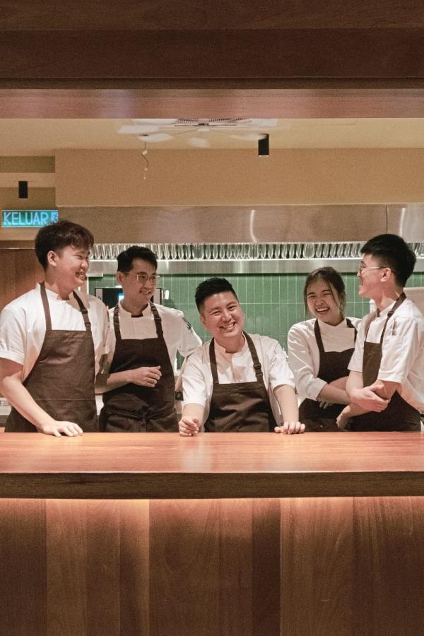 YC (centre) opened modern Malaysian restaurant Terra Dining because he believed that there was room for growth and the opportunity to wade into unchartered waters. — TERRA DINING