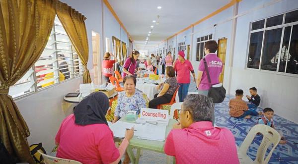 General health screening counselling counter during outreach programme. Photo: SCAN