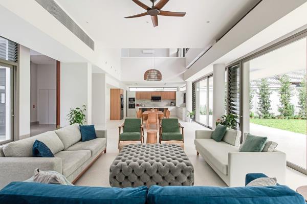 At the centre of Light Box house are the main living and kitchen areas, which serve as a focal point in the home.