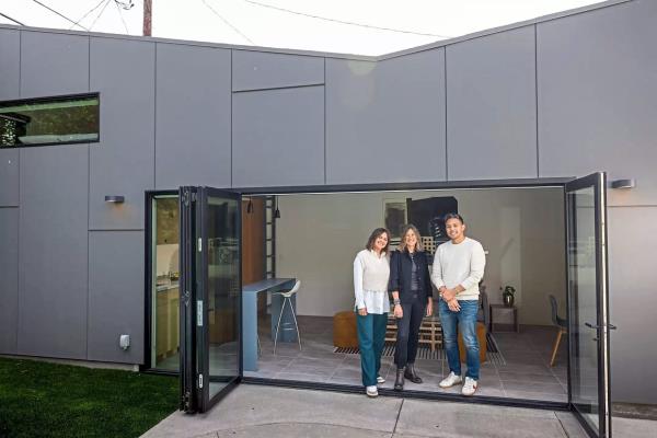 Huff (left) and her husband Reggie Panaligan, with architect Little.