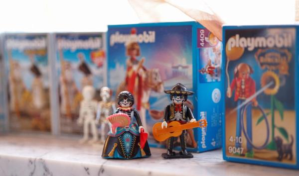 The logo of German toy company Playmobil is seen in front of several figures during the 73rd Toy Fair (Spielwarenmesse) in Nuremberg, southern Germany, on January 30, 2024. — AFP