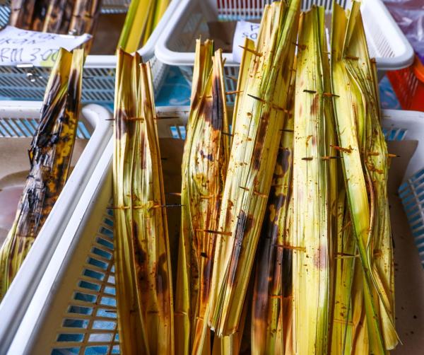 Wrapped in nipah palm leaves, pais is made from sago flour and coco<em></em>nut mixed with fish and other seafood. - ZULAZHAR SHEBLEE/The Star