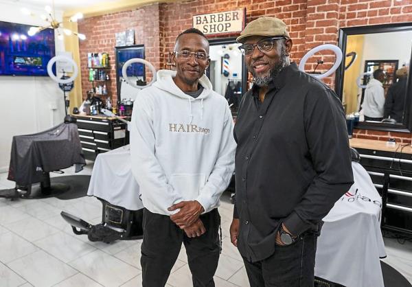 Brothers Rodney and Marichal (right), owners of HAIRitage Salon in Sacramento, are part of a growing natio<em></em>nal network of Black barbers and stylists who have become fro<em></em>ntline mental health advocates in their communities.