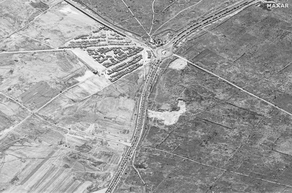 This handout satellite image shows lorries at Rafah, on Egypt’s border with Gaza and the Gaza side of the Rafah border crossing with Egypt. According to a US media report and Egyptian human rights monitor, Egypt is co<em></em>nstructing a walled camp in the Sinai Peninsula to receive displaced Palestinian civilians from the Gaza Strip. — AFP