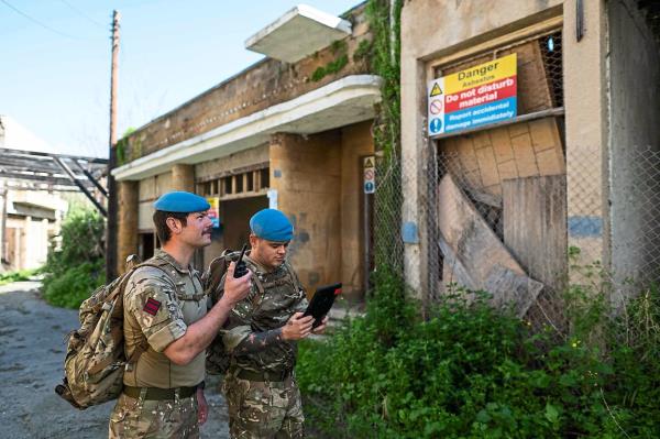 Members of the United Nations Peacekeeping Force in Cyprus (UNFICYP) from the British Army's 71 Engineer Regiment patrol along the buffer zone, which separates the internatio<em></em>nally recognized Republic of Cyprus and the breakaway Turkish Republic of Northern Cyprus (TRNC)?recognized o<em></em>nly by Ankara?in the divided capital Nicosia on February 21, 2024. EU member Cyprus has been divided since 1974 when Turkish forces occupied the island's northern third in respo<em></em>nse to a military coup spo<em></em>nsored by the junta then in power in Greece. (Photo by Jewel SAMAD / AFP)