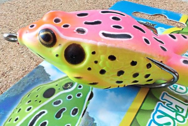 The hooks are hidden on this lure so it will not snag on weeds, but this frog lookalike has a soft, collapsible body that will flatten when a predatory fish bites it, exposing the hooks.