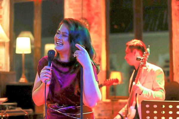 Velvet is all smiles as she interacts with fans at one of her shows.