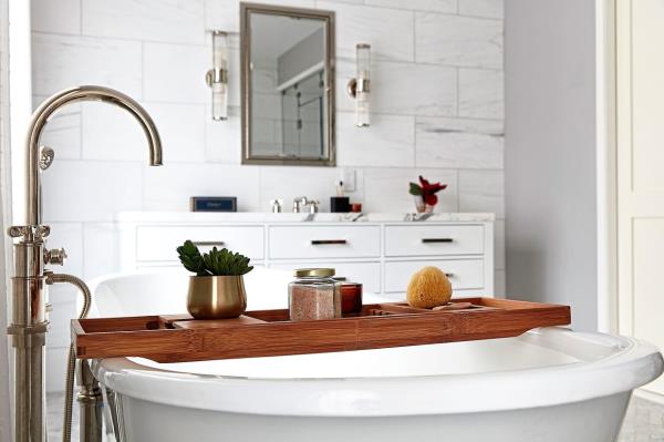 Satin nickel fixtures provide both warmth and elegance in this bathroom. Photo: Scott Gabriel Morris/TNS
