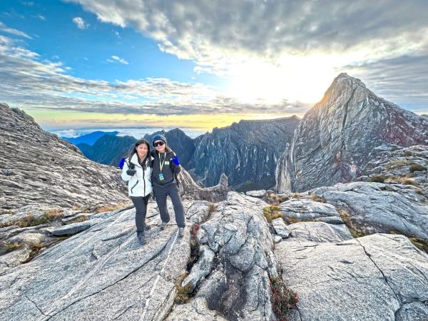 Yue Lyn (right) climbed Mount Kinabalu with a Vietnamese friend. — YUE LYN