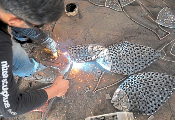 At Nizam's studio, recycled materials find new purpose as works of art. 