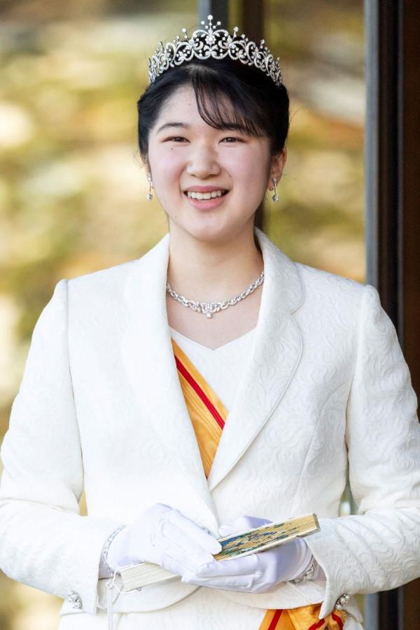 This file photo taken on December 5, 2021 shows Japan's Princess Aiko, daughter of Emperor Naruhito and Empress Masako, greeting members of the media on the occasion of her coming-of-age at the Imperial Palace in Tokyo, after celebrating her 20th birthday on December 1. Japanese lawmakers kicked off discussions on May 17, 2024 a<em></em>bout possible relaxations to the imperial family's strict succession rules, although women will likely remain barred from the Chrysanthemum Throne. — AFP