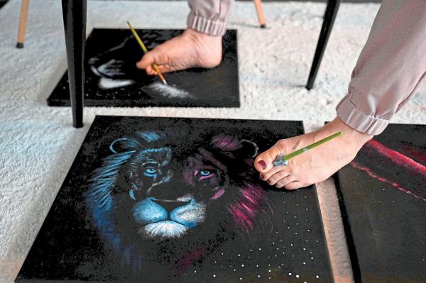 With her unique painting skills, Rajacenna has attracted some famous admirers, notably pop star Justin Bieber. Photo: AFP 