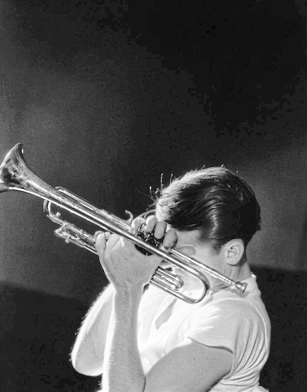 An image of jazz musician Chet Baker, taken by Herman Leonard, in New York in 1956. Photo: Victoria and Albert Museum 