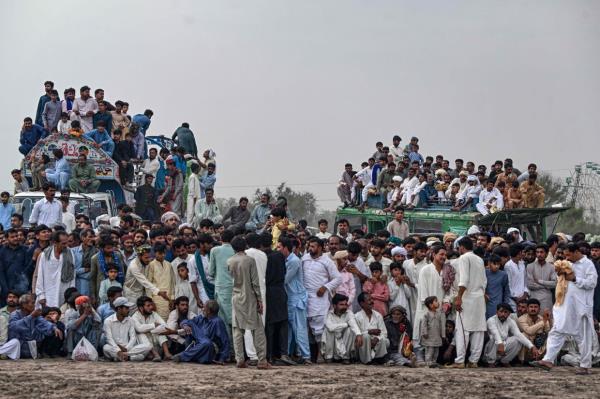 Villagers watching a kabaddi match at the annual mela in Shah Jiwana, Jhang district, Punjab, Pakistan. Photo: AFP 
