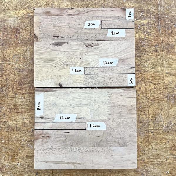 Time to mark your measurements! Refer to the picture and mark where to make the cuts on both pieces of wood. You can make adjustments based on the size of your items.