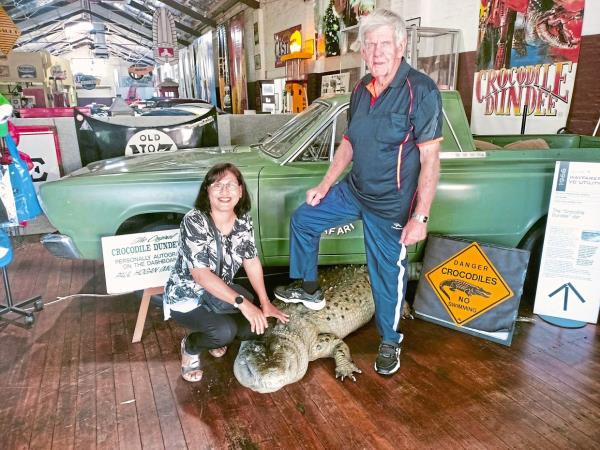 The reader and her friend, Hoss, with the car featured in one of Australia’s most famous films, Crocodile Dundee. — Photos: SHEELA KANAGASABAI