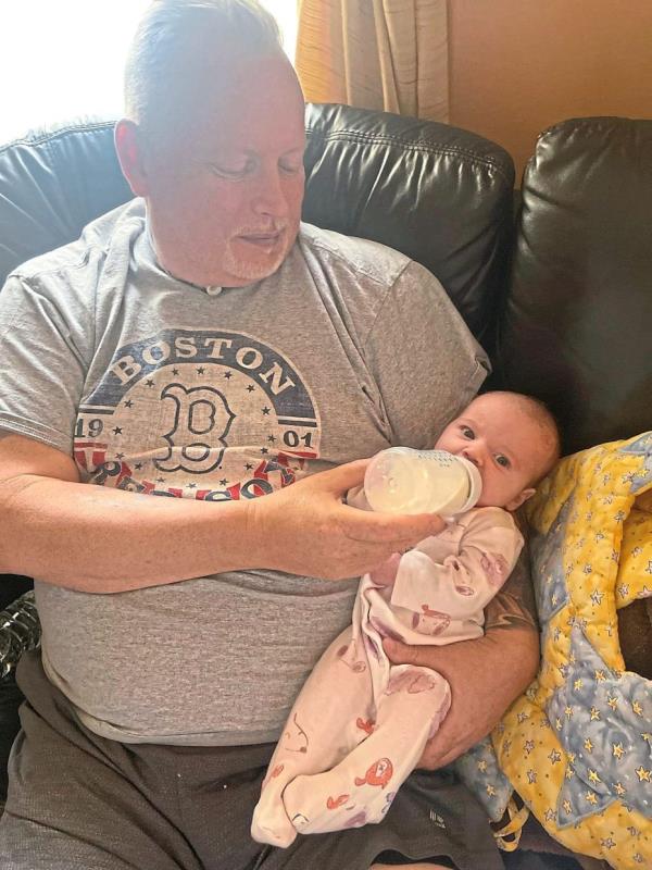 Now that he can speak, Kedian can’t wait to read bedtime stories to his granddaughter, Charlotte.