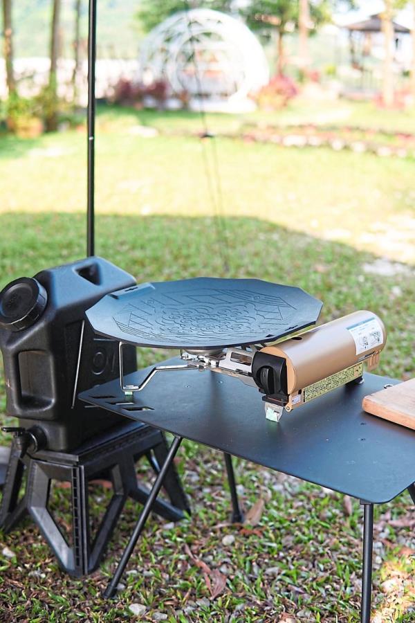 You can lay a griddle on top and cook meals for four to six people with it.