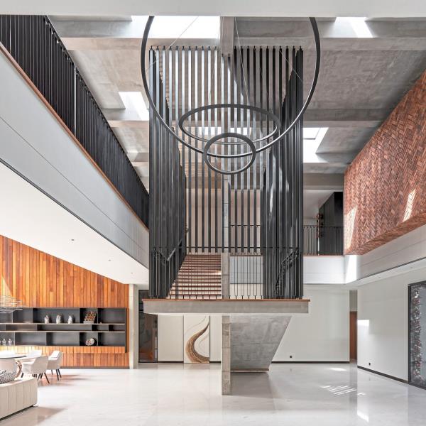 The Nemo Kepler, a decorative lighting fixture by Arihiro Miyake, anchors the space.