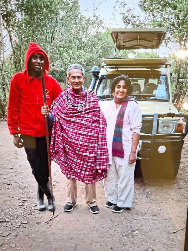 Dressed in Masai attire, the writer’s husband Dr Hari Dass is flanked by the writer and a Masai tribesman. Photos: Chandrika Nair