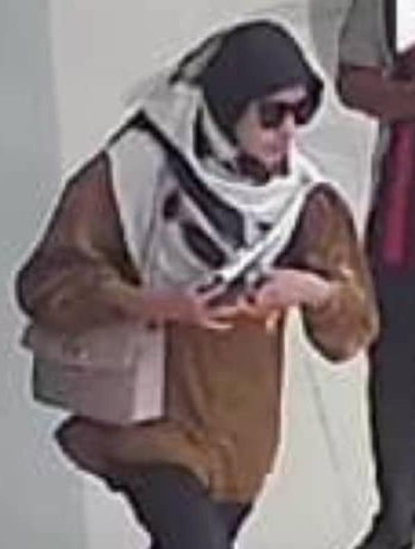 The suspect was caught on camera making her escape.