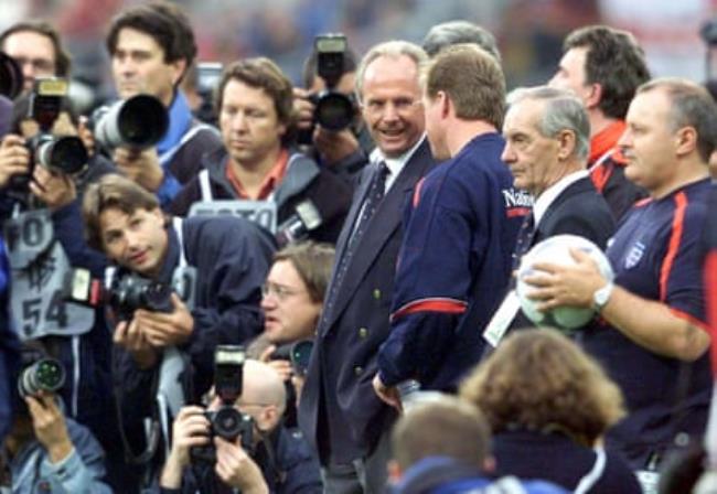 Sven-G?ran Eriksson, with coaches Steve McClaren and Tord Grip, watches his team warm up.