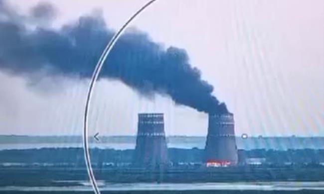 A grab from video released by the Ukrainian Presidential Press Service on 11 August 2024, shows a fire in a cooling tower at the Russian-co<em></em>ntrolled Zaporizhzhia nuclear power plant in Ukraine.