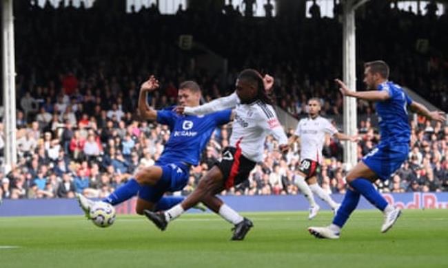 Alex Iwobi scores the 70th-minute goal that handed Fulham their first win of the season.