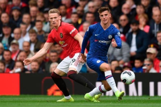 Mason Mount (right) battles with Scott McTominay during his Premier League debut for Chelsea at Manchester United in August 2019.