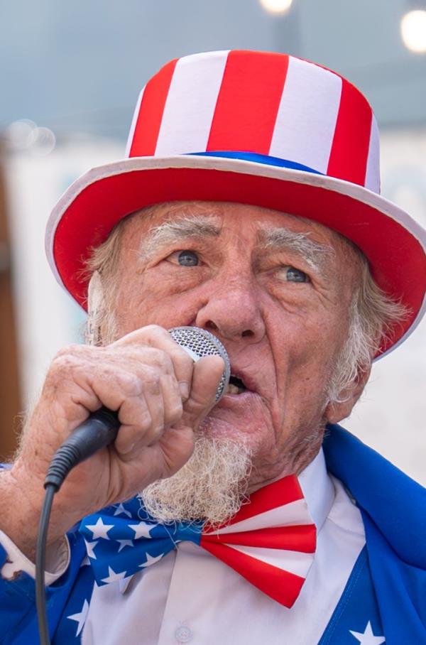 A man in an Uncle Sam costume speaks in support of Trump outside the Republican Natio<em></em>nal Co<em></em>nvention on July 19 in Milwaukee, Wisconsin.