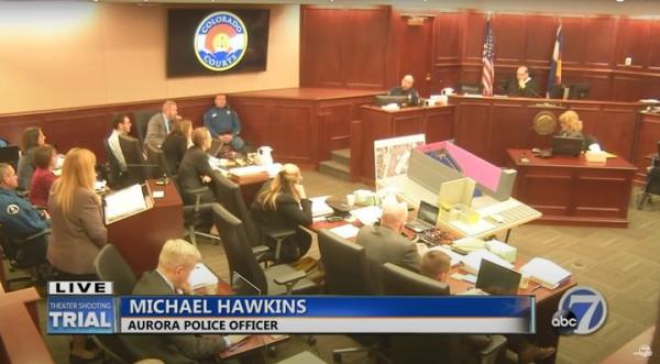 Michael Hawkins is shown on KMGH-TV in Denver as he testifies in court in 2015 a<em></em>bout police respo<em></em>nse to the massacre at movie theater in Aurora, Colorado.
