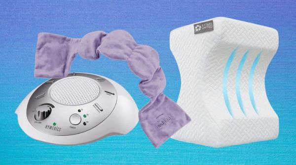 A Homedics white noise machine, Nodpod eye mask and memory foam knee pillow.