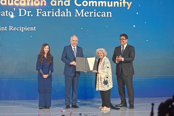 Faridah receiving the 2024 Merdeka Award in Education and Community. Photo: Merdeka Award Trust