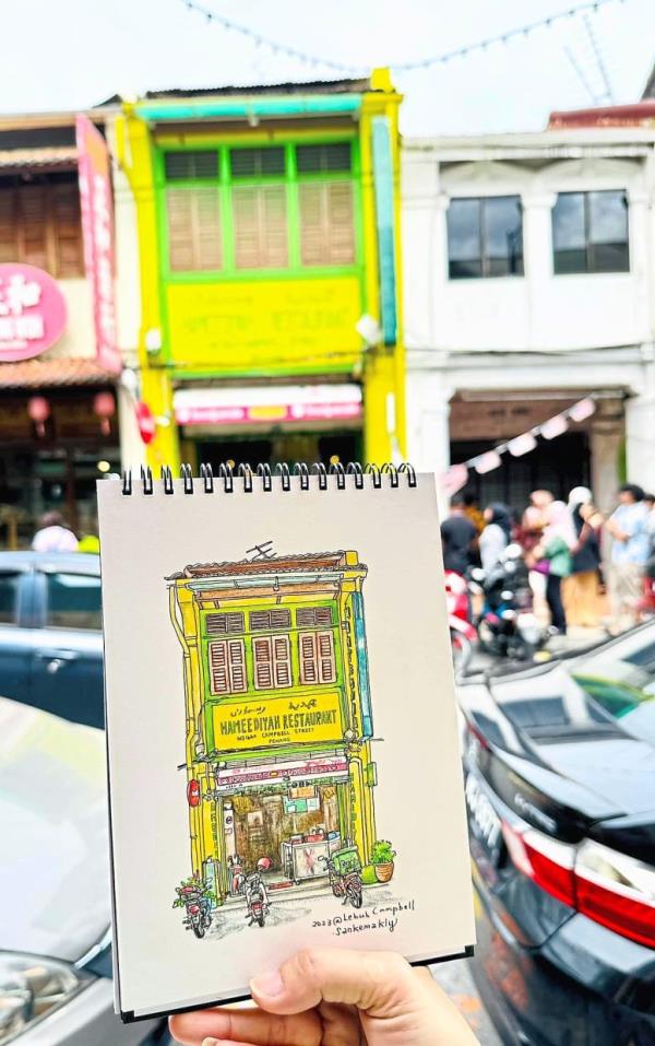 In addition to their sketchbook work, the duo captured over 5,000 reference photos during their time in George Town, using the images to inform and refine their drawings. Photo: Sankemakly