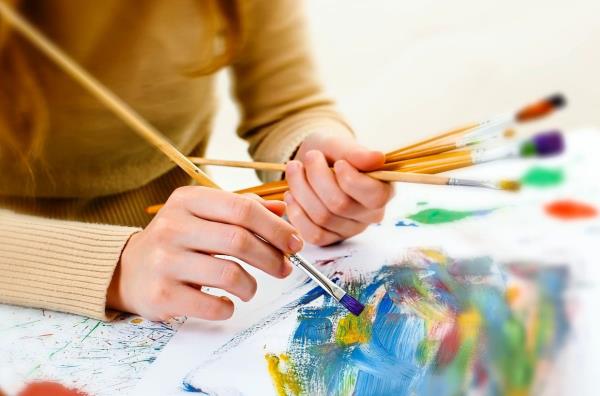 Painting offers a creative outlet for autistic individuals. 