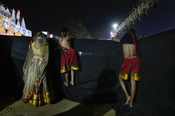 Children performing the characters of foot soldiers in Vanar Sena, or mo<em></em>nkey brigade, wait backstage for their turn to perform in Ramleela. Photo: AP 