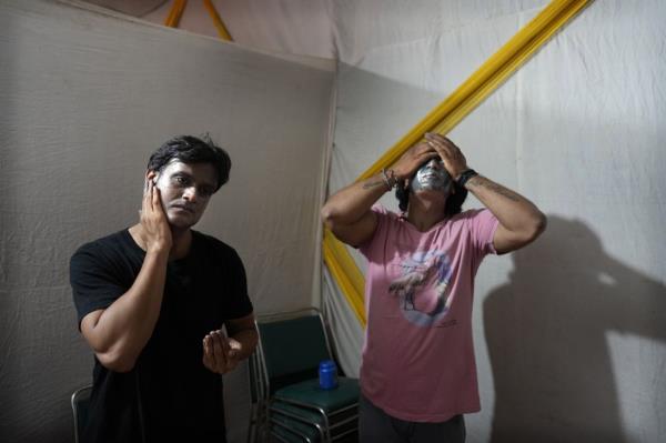 Actors remove their makeup backstage after performing Ramleela, a folk re-enactment of the life of Hindu god Rama from the ancient epic Ramayana, in New Delhi. Photo: AP 