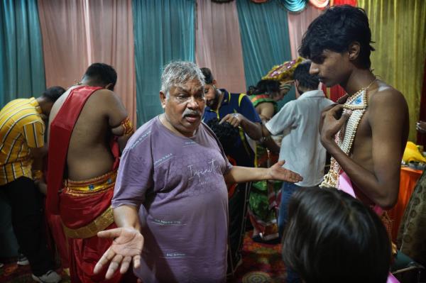 An actor dressed as a deer waits for the cue to go o<em></em>nstage during a Ramleela performance. Photo: AP 