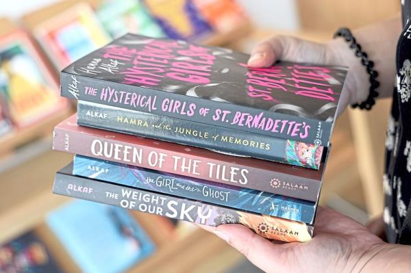 Hanna's bestselling, critically acclaimed books for kids and teens, including 'The Weight Of Our Sky', 'The Girl And The Ghost', 'Queen Of The Tiles', Hamra and the Jungle Of Memories' and the new release 'The Hysterical Girls Of St Bernadette’s'. Photo: The Star/Art Chen