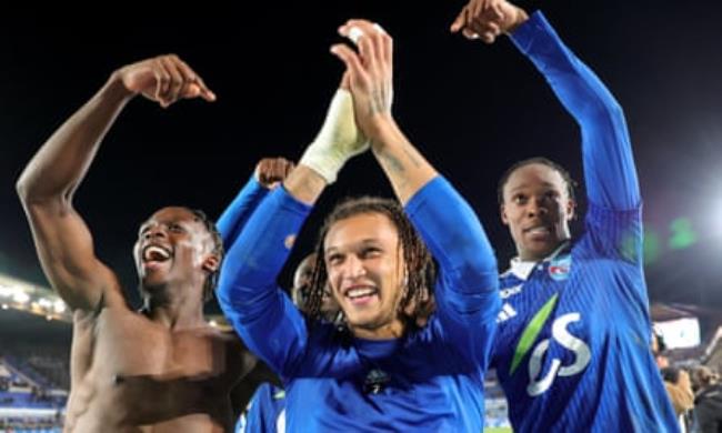 Diego Moreira (centre) celebrates after scoring the winner for Strasbourg against Marseille.