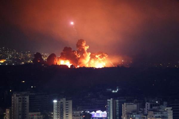 Smoke and flames rise over Beirut's southern suburbs after a strike, amid the o<em></em>ngoing hostilities between Hezbollah and Israeli forces, as seen from Sin El Fil, Lebanon, October 3