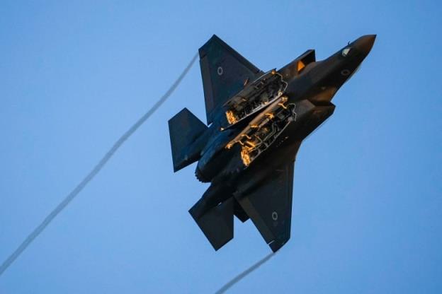 An Israeli air force F-35 war plane flies over during a graduation ceremony for new pilots in Hatzerim air force ba<em></em>se near the southern Israeli city of Beersheba, Israel, Thursday, June 29, 2023. 