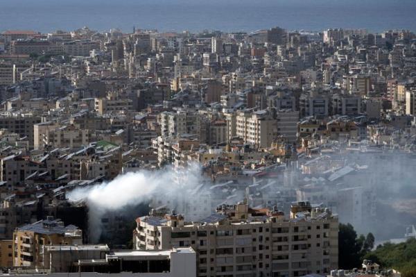 Smoke rises after an Israeli airstrike that hit Dahiyeh suburb, in Beirut, Lebanon, Tuesday, Oct. 1