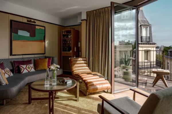 The stylish suites feature modernist art, and custom furnishings offset with antique pieces.
